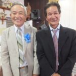 「式典が何とか成功してよかった」と喜ぶ芝田全宏さん（左）、中田一男さん