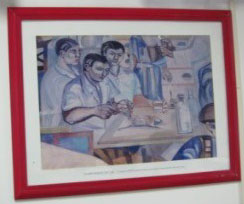 国民的画家ジェンネル・アウグストによって１９５５年に描かれた、バイーア連邦大学医学部で研究中の野口英世を描いた絵の複製画（写真＝毛利さん提供）