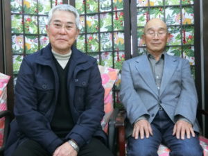 （左から）長田会長、村田相談役