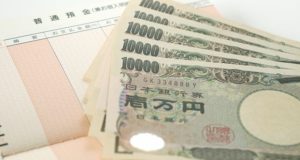 一万円札と通帳