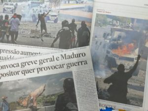 反政府のデモ隊に治安部隊の装甲車が突入する様子を報じたブラジル紙