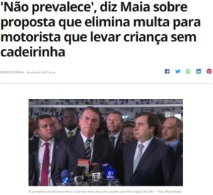 道路交通法改正案を下院に届けた時のボルソナロ大統領（中央）とマイア議長（６日付Ｇ１サイトの記事の一部）