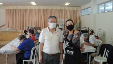 右から小田会長と妻のLourdinhaさん